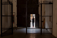 Lone Figure Enters Doorway