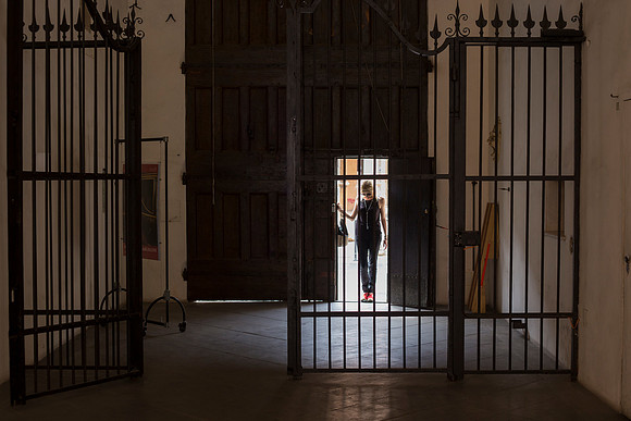 Lone Figure Enters Doorway