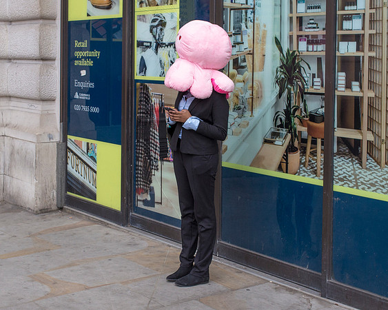 Girl With Pink Octopus Hat On Head