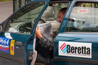 Taxi Driver Catching Up On News