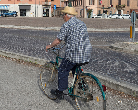 Cyclist In Hat